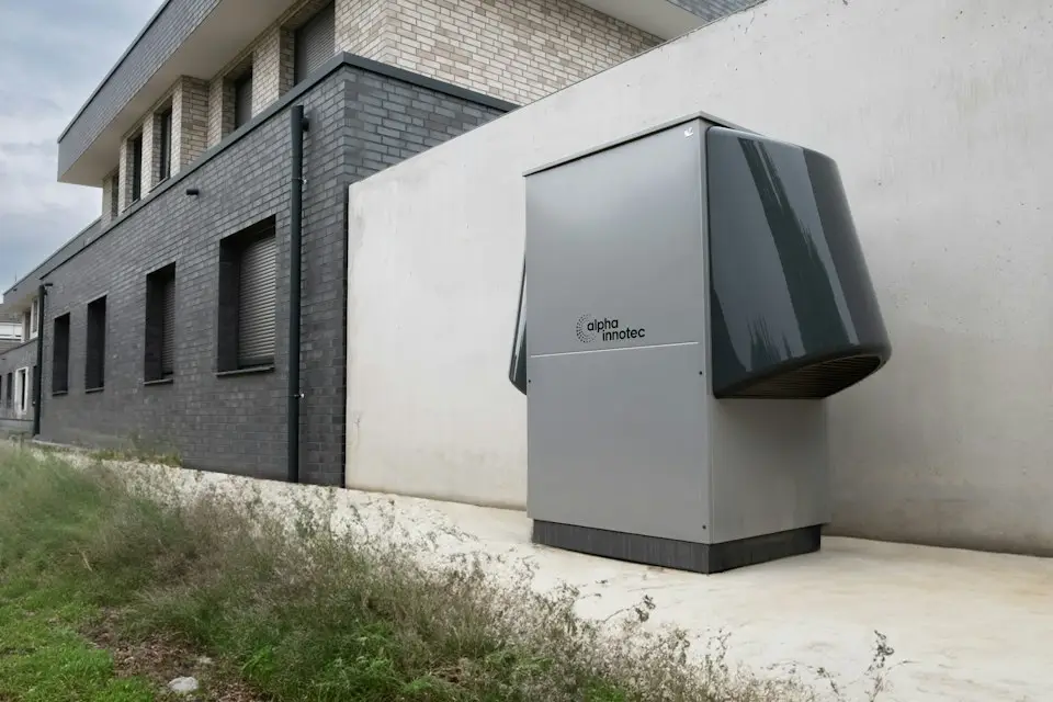 Technician providing air conditioning servicing